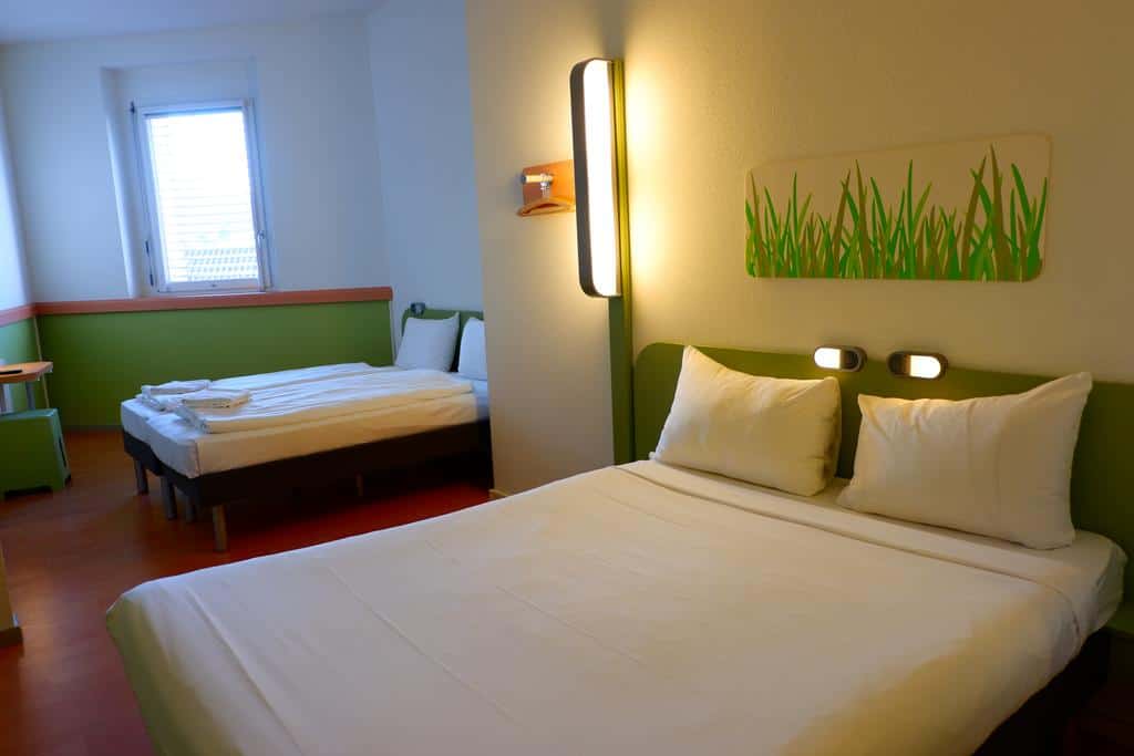 Basic family room with double and single beds