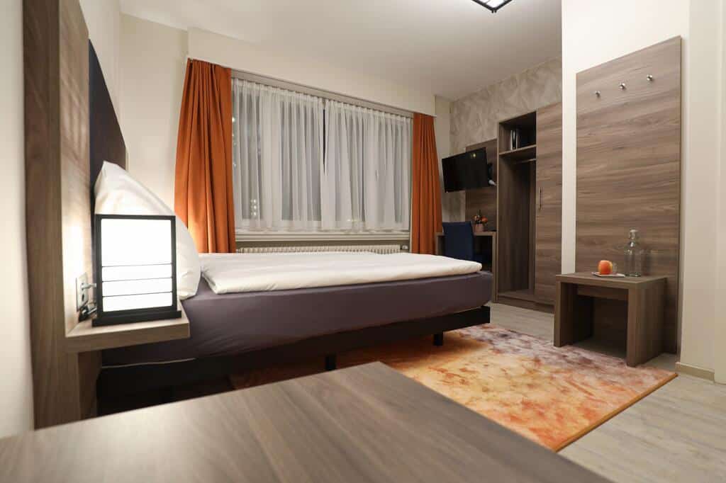 Small modern room with wood accents and cozy layout