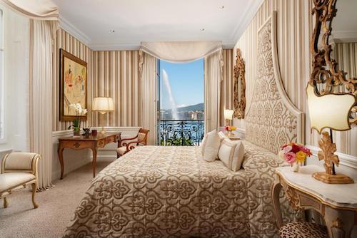 Ornate luxury room with lake view and classic decor