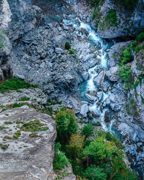 The BEST 8 Day Switzerland Itinerary For First-Timers (2025) 17 Trümmelbach Falls cutting through rocky Swiss cliffs