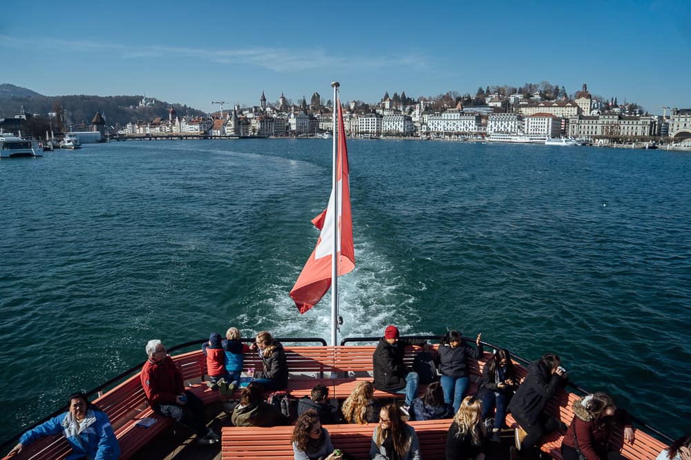 Boat ride across Lake Lucerne, Swiss flag waving