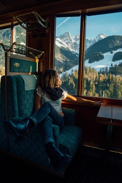The BEST 8 Day Switzerland Itinerary For First-Timers (2025) 31 Woman enjoying view from scenic train