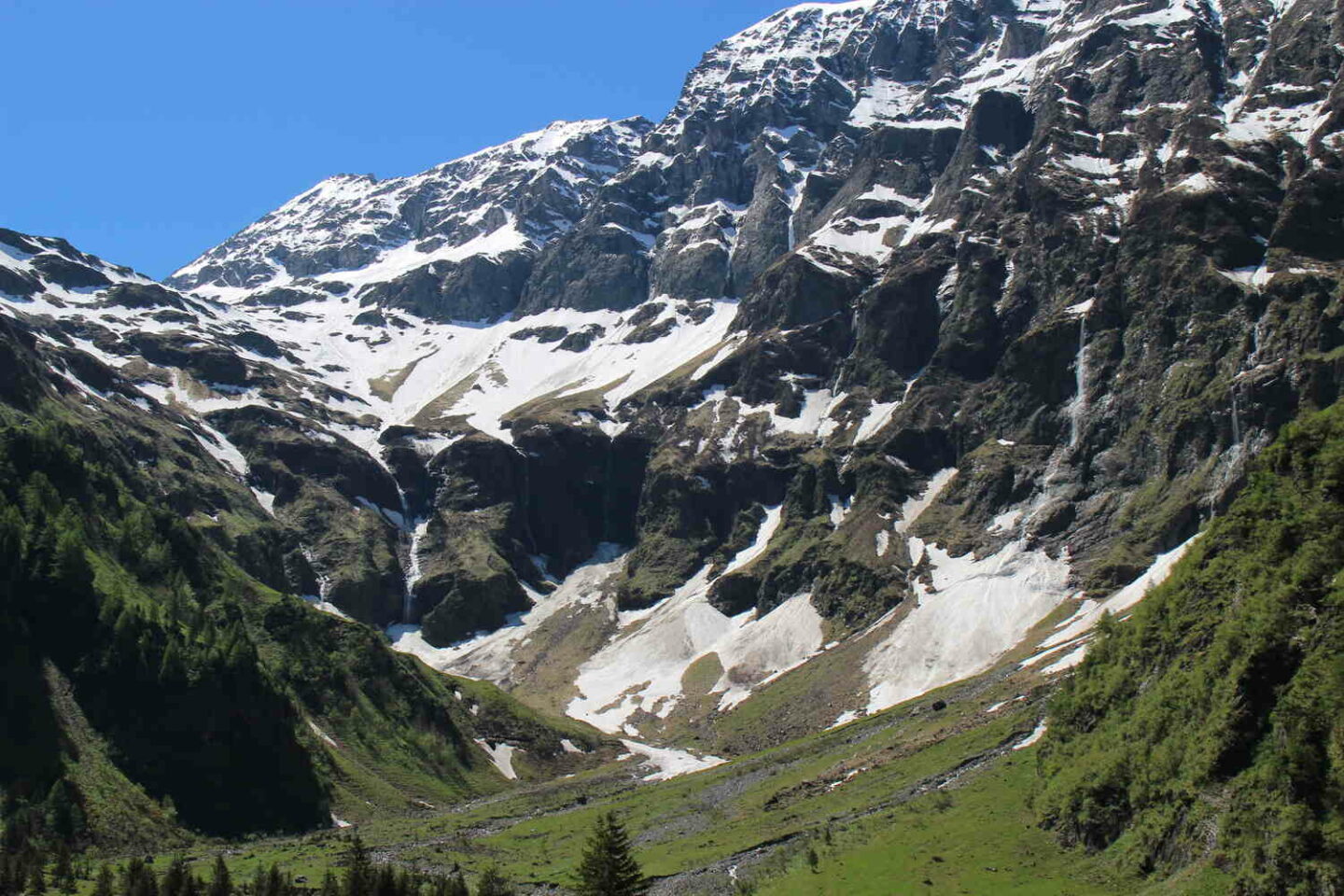 View over snowy peaks from the Obersteinberg trail